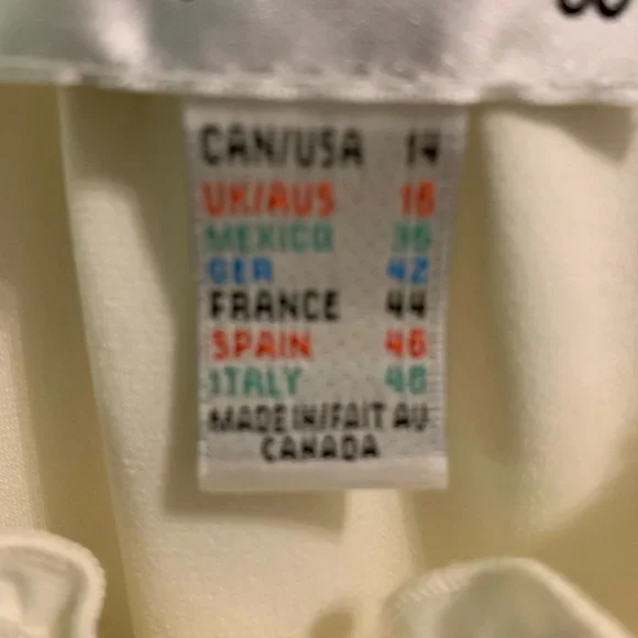 Sleeveless Ruffle Blouse - Picture 5 of 6